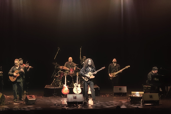 L to R: Geoff Hlibka Guitar,  Osvaldo Rodriguez violin, JL, Tom Bigas drums, Jarrod Ross bass, Jordan Abraham keyboards.