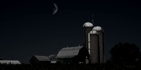 Moon over barn