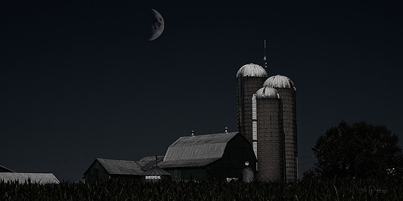 Moon over barn